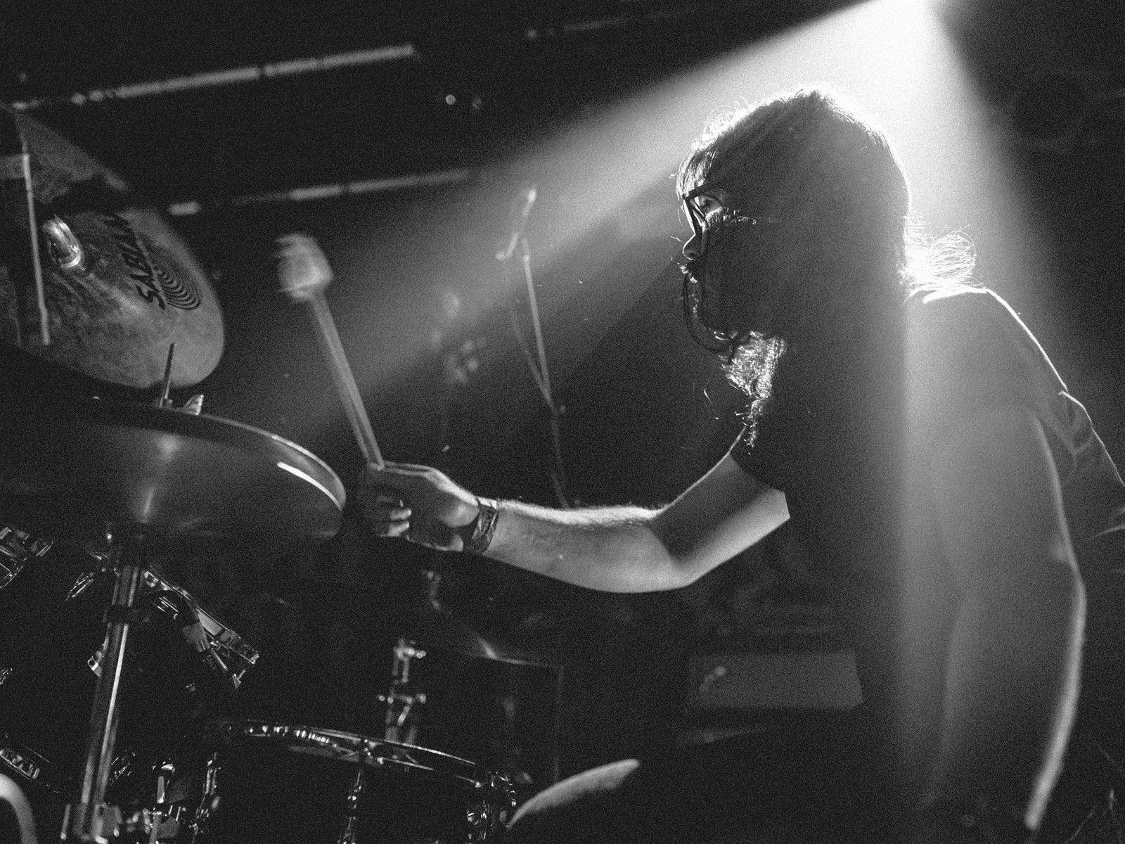 Rama Parwata on-stage playing the drums.