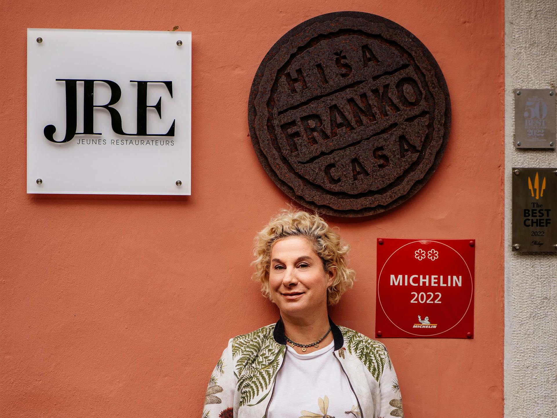 Ana Roš standing outside her award-winning restaurant