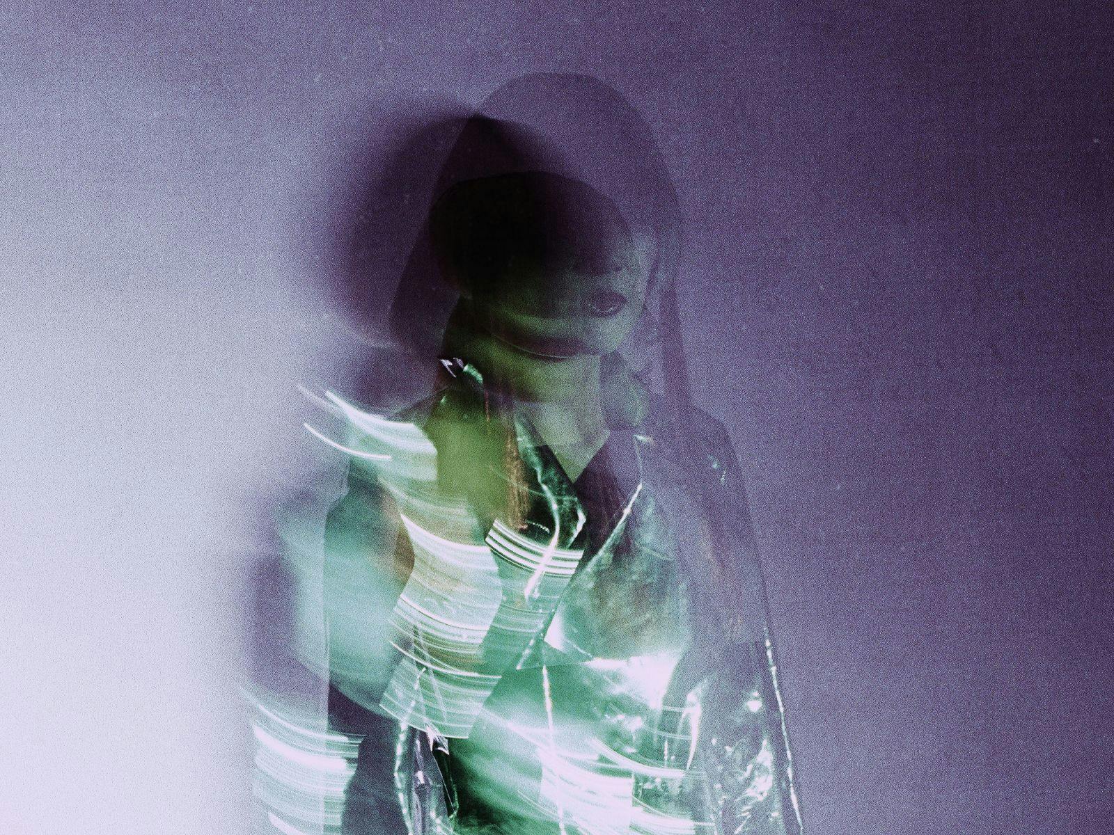 A highly blurred double-exposure like image of CORIN.